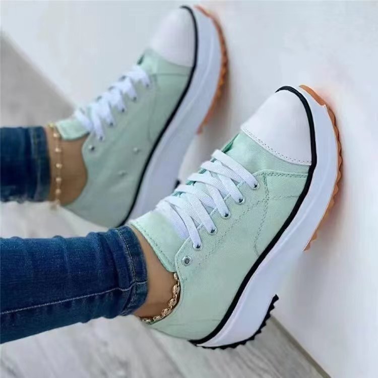 Scarpe da ginnastica con plateau da donna alla moda, con tomaia in morbida tela e suola robusta, ideali per il comfort di tutti i giorni.