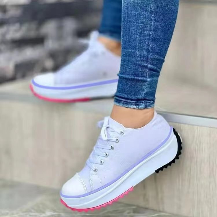 Scarpe da ginnastica con plateau da donna alla moda, con tomaia in morbida tela e suola robusta, ideali per il comfort di tutti i giorni.