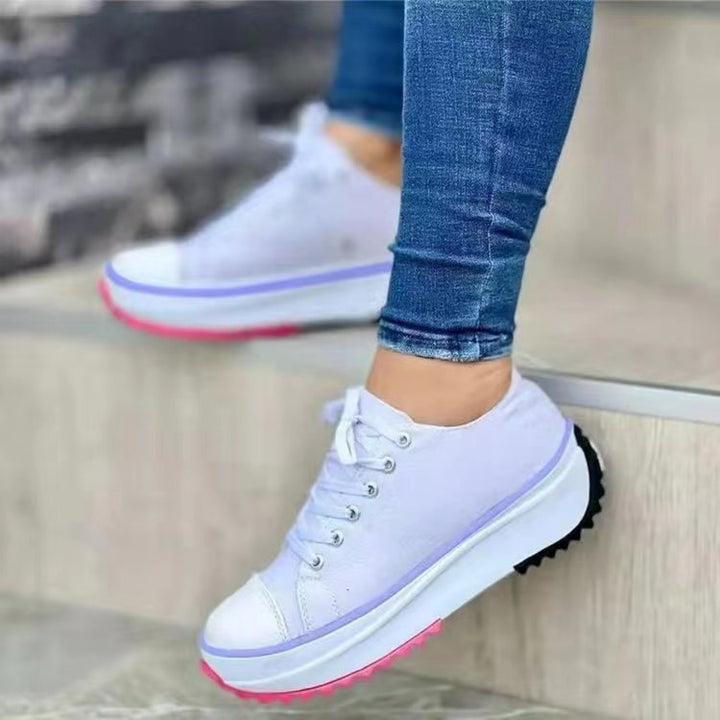 Scarpe da ginnastica con plateau da donna alla moda, con tomaia in morbida tela e suola robusta, ideali per il comfort di tutti i giorni.