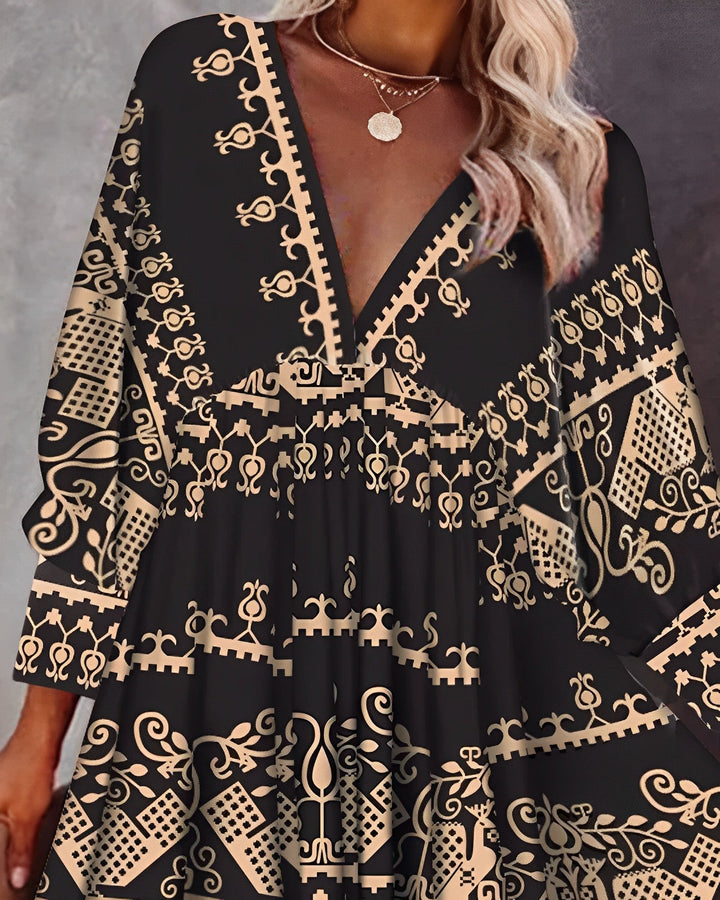 Elegante abito boho da donna con profonda scollatura, maniche lunghe e taglio leggero e arioso per un'eleganza eccezionale.