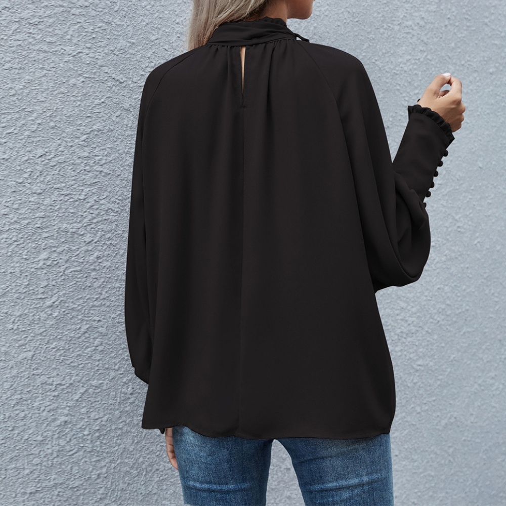 Elegante blusa Isalie in chiffon con fiocco e maniche a palloncino - un look elegante e raffinato