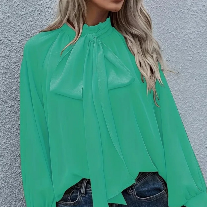 Elegante blusa Isalie in chiffon con fiocco e maniche a palloncino - un look elegante e raffinato