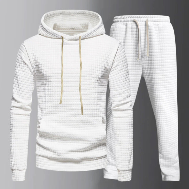 Set di eleganti felpe con cappuccio con coulisse regolabile e comodi pantaloni assorti da uomo