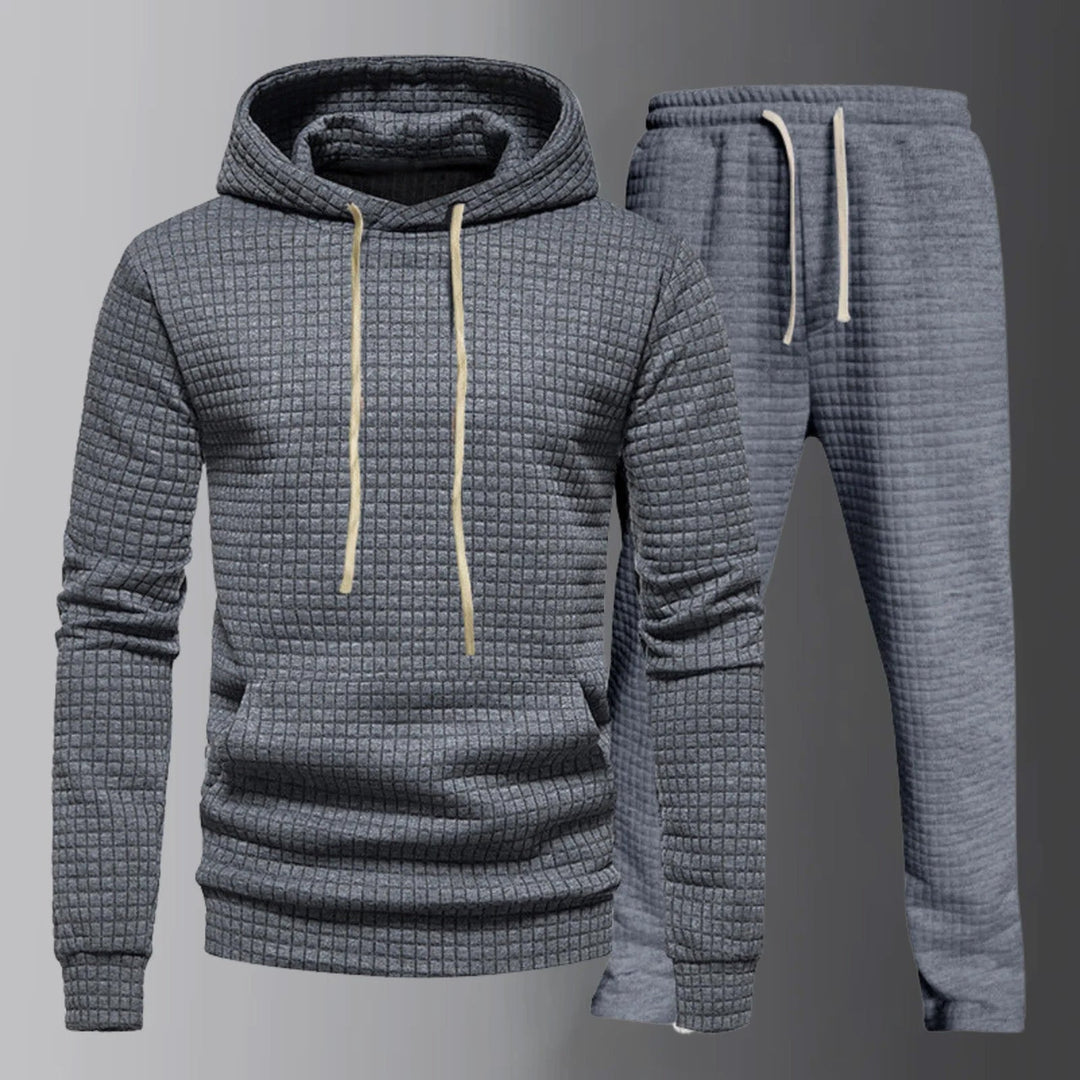Set di eleganti felpe con cappuccio con coulisse regolabile e comodi pantaloni assorti da uomo