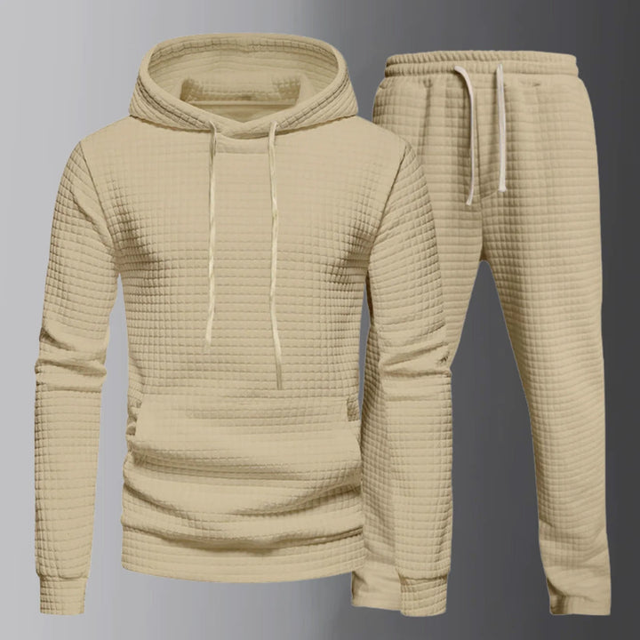 Set di eleganti felpe con cappuccio con coulisse regolabile e comodi pantaloni assorti da uomo