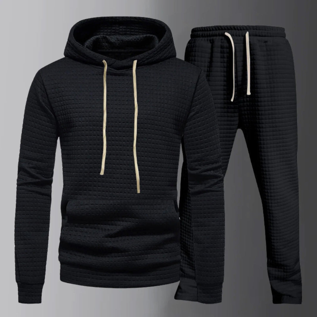 Set di eleganti felpe con cappuccio con coulisse regolabile e comodi pantaloni assorti da uomo