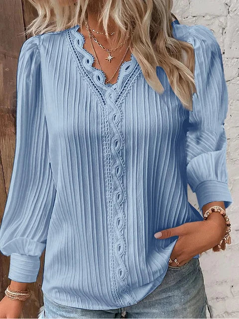 Elegante blusa da donna con scollo a V, collo lungo a buffo e sottili ruches