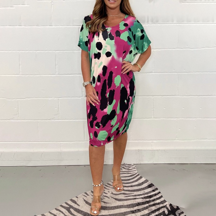Elegante abito da donna al ginocchio con vestibilità ampia, maniche corte e scollatura rotonda - perfetto per le occasioni di tutti i giorni
