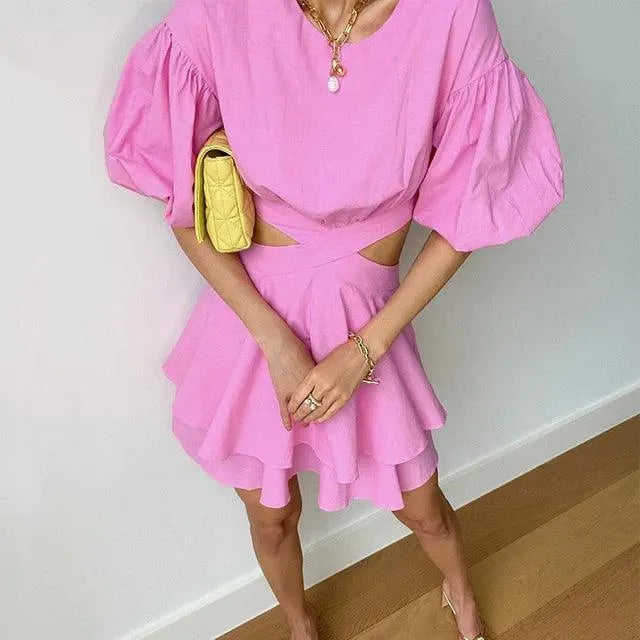Mini accappatoio da donna alla moda con polsini, buffs e scollatura in un design Denim alla moda