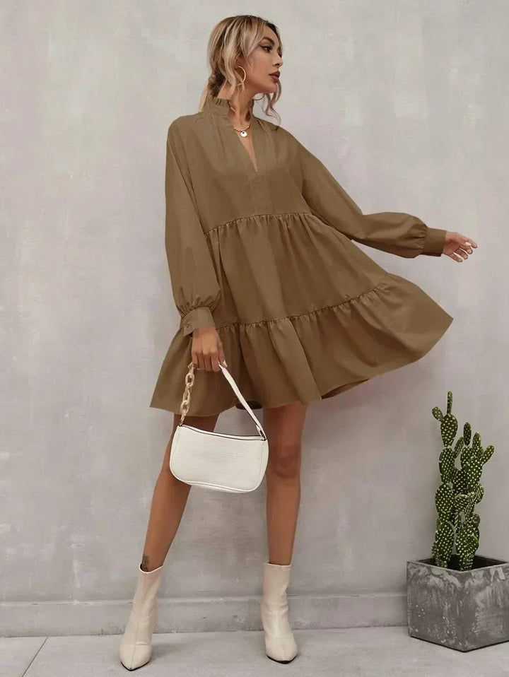 Elegante gilet da donna dalla linea ad A con vistose pieghe, lunghezza regolabile ed elegante scollatura a V, con maniche lunghe aderenti - leggero e sofisticato
