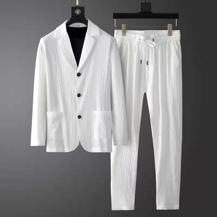 Elegante ensemble casual da uomo - Blazer slim fit e pantaloni jogger eleganti in tessuto testurizzato con chiusura a tre bottoni