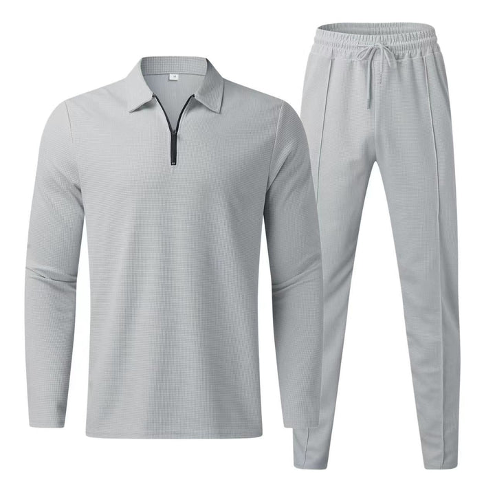 Elegante polo a maniche lunghe e comodi pantaloni da uomo