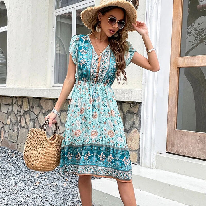 Elegante giubbotto boemo con stampa a fiori - V-hals Wikkelstijl e Korte Mouwen per un pasvorm da favola