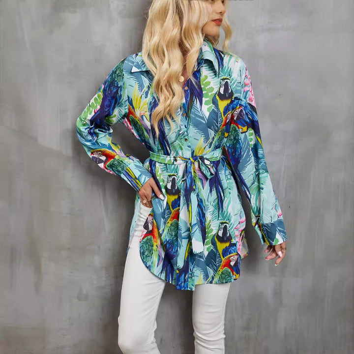 Elegante blusa da donna con maniche lunghe e motivo tropicale - taglio svasato con scollatura a punta