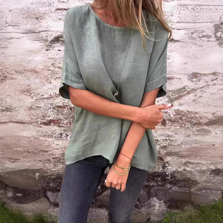 Elegante camicia da donna in lino melange con fondo svasato ed eleganti polsini a tutta lunghezza - ideale per le occasioni informali