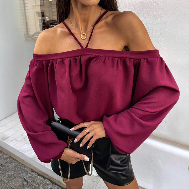 Top da donna alla moda con motivo leopardato, scollo a V, taglio ampio, polsini lunghi e motivo vintage alla moda