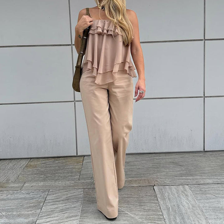 Elegante top da donna senza maniche con linea ad A, con sorprendenti rouches a strati e morbide rifiniture in chiffon