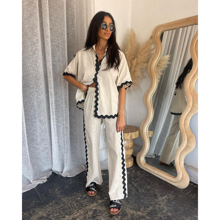 Elegante giacca-camicia da donna in cotone leggero e traspirante - vestibilità ariosa, elegante chiusura con bottoni a pressione sull'orlo e facile allacciatura anteriore