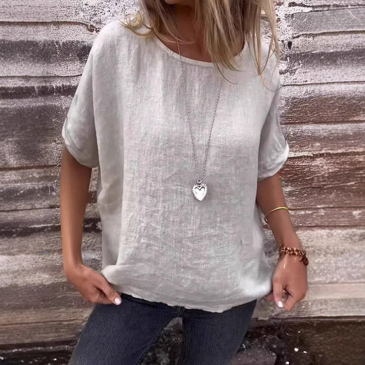 Elegante camicia da donna in lino melange con fondo svasato ed eleganti polsini a tutta lunghezza - ideale per le occasioni informali