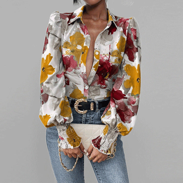 Gilet oversize da donna con stivali regolabili, maniche abullonate alla moda, splendida fantasia floreale ed eleganti nappe sui polsini