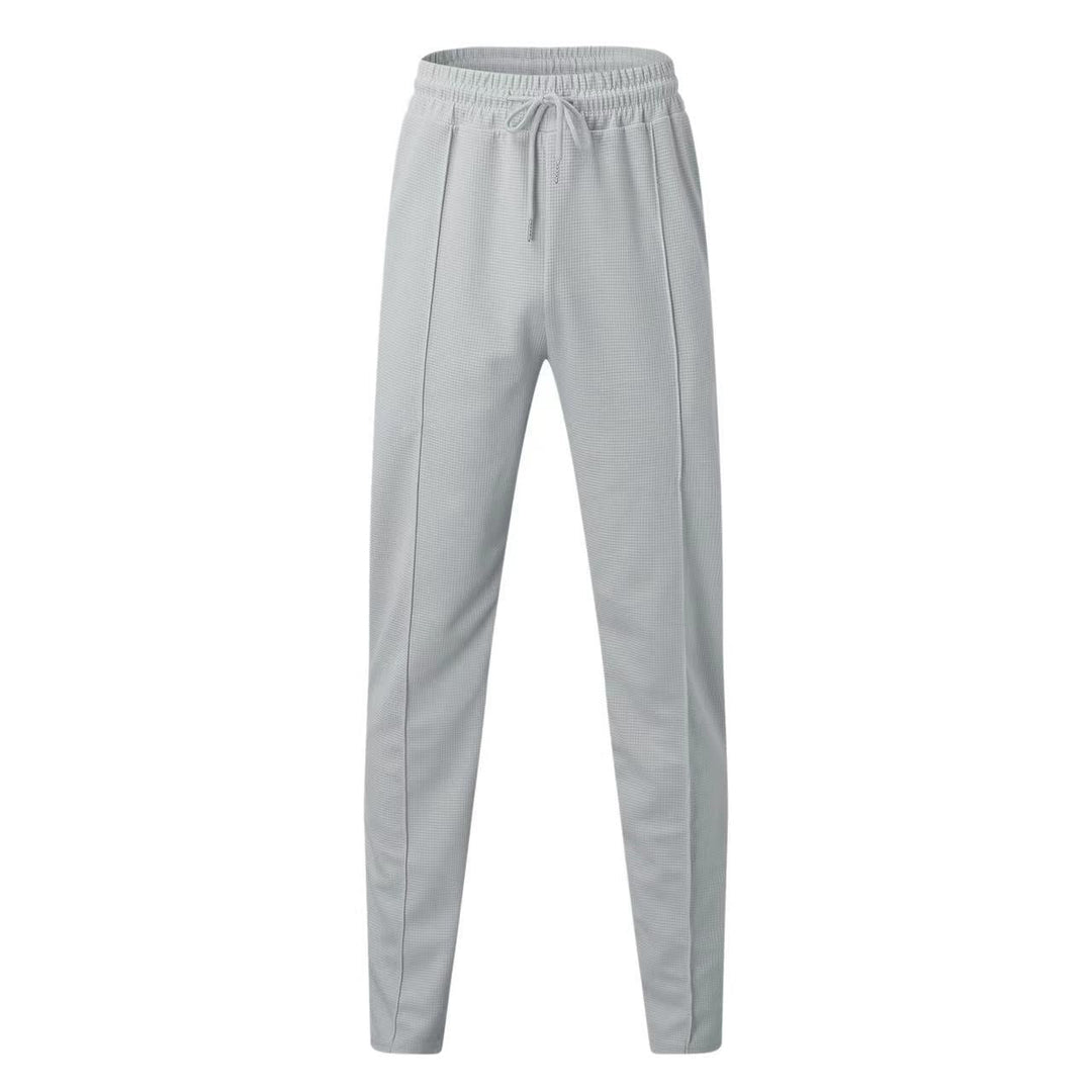 Elegante polo a maniche lunghe e comodi pantaloni da uomo