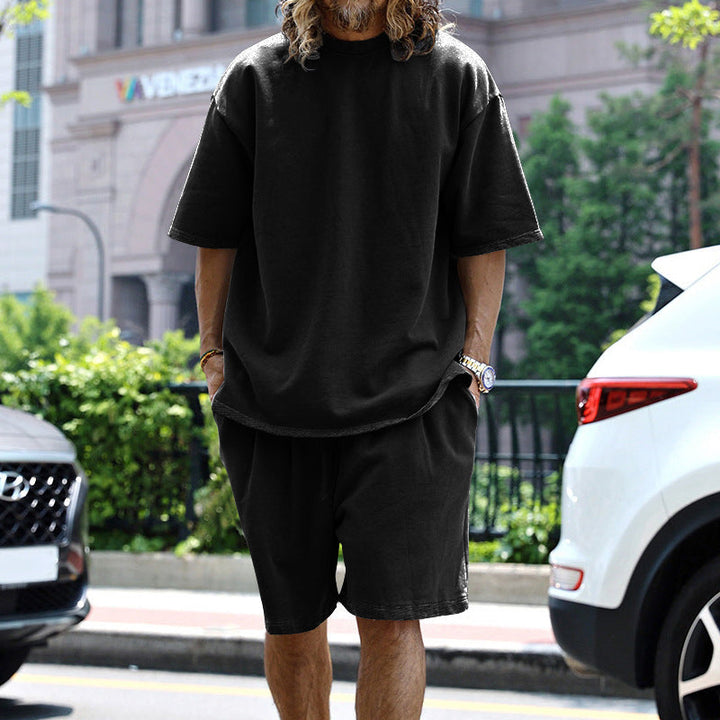 Set di abbigliamento sportivo oversize per uomo - T-shirt elegante, pantaloncini corti con coulisse, vestibilità comoda e moderna
