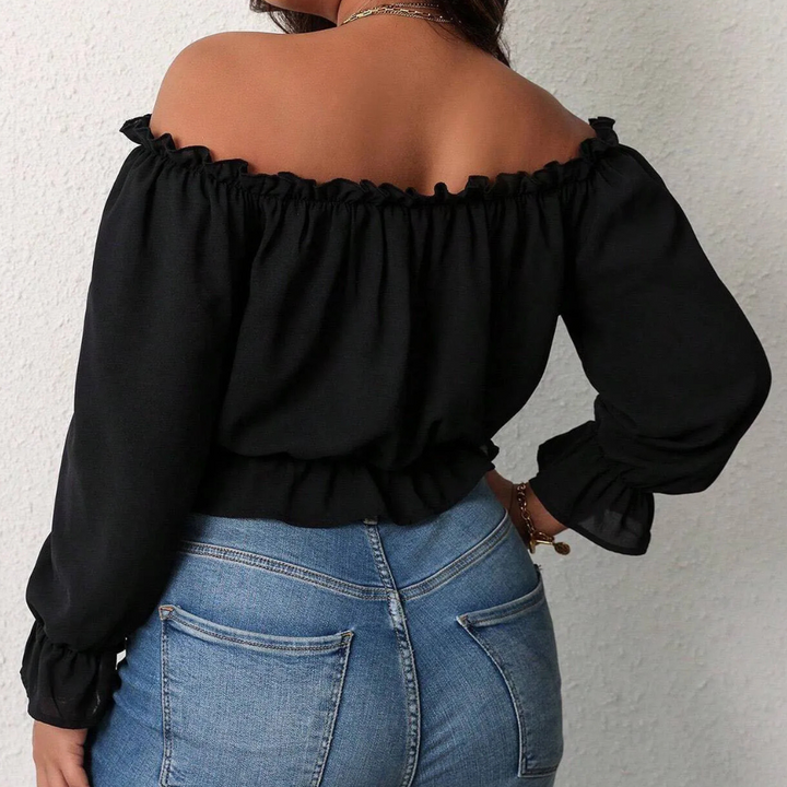 Elegante camicetta da donna con maniche a bufalo e scollatura a cuore: una scelta elegante, lunga e confortevole