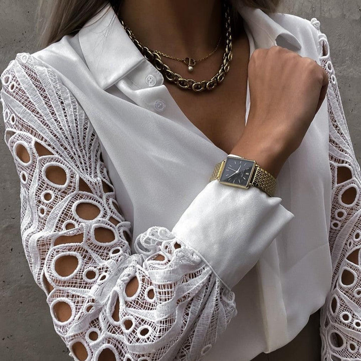 Elegante blusa da donna con maniche lunghe, accattivante scollatura profonda e dettaglio con bottoni - eleganza senza tempo