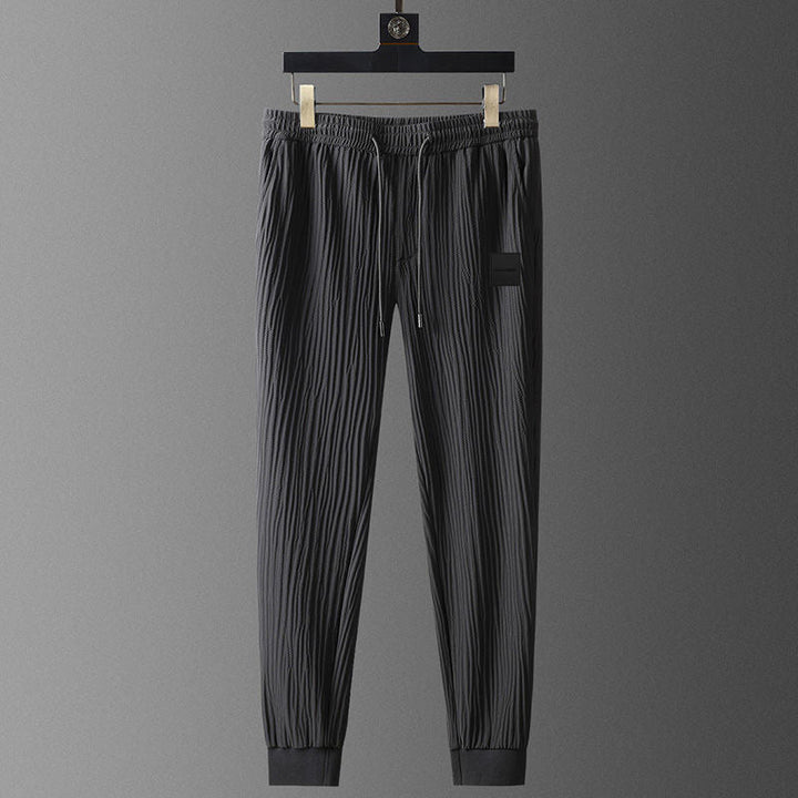 Elegante set tuta da uomo in tessuto plissettato - comoda T-shirt a maniche corte e comodi joggers dalla vestibilità rilassata