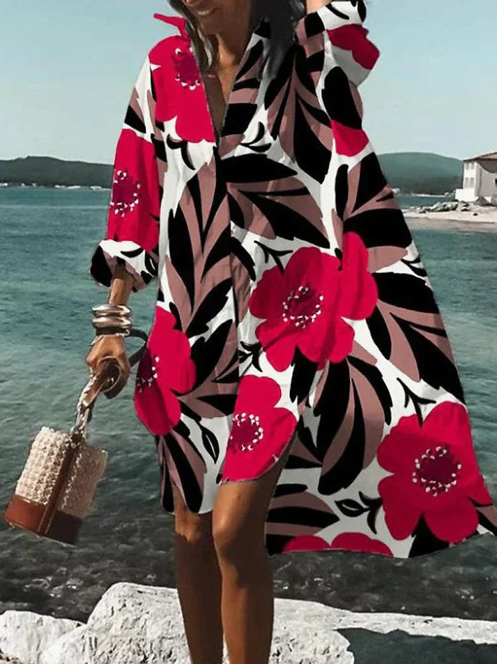 Elegante vestaglia da donna svasata con scollo a punta e polsini lunghi - elegante inserto asimmetrico