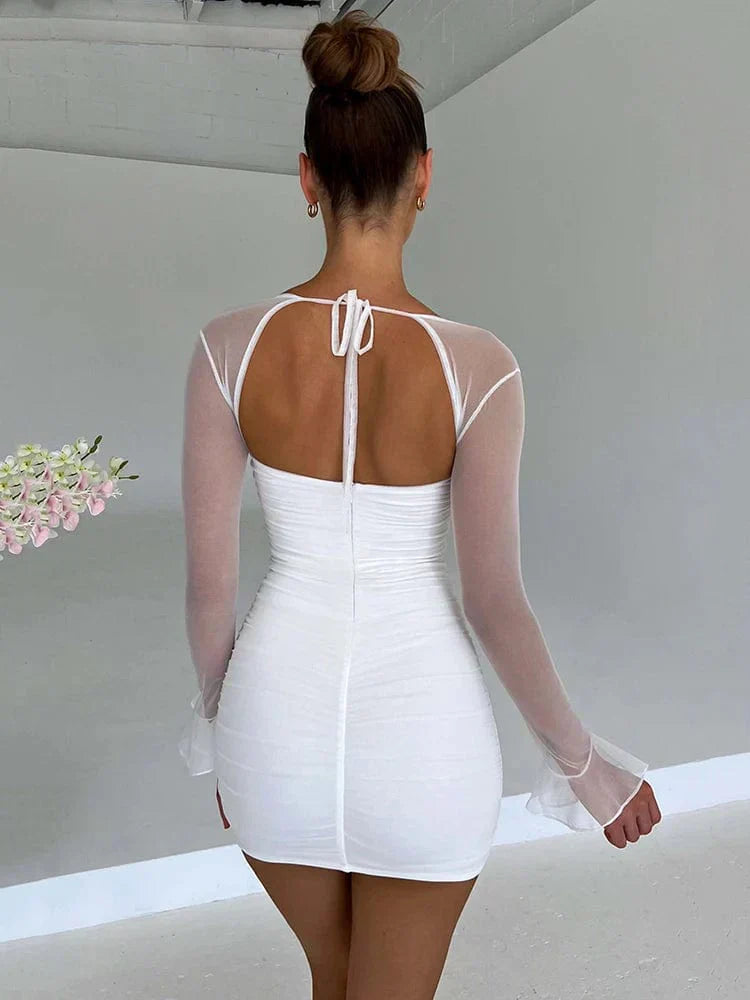 Elegante tunica da donna con collo alto ed eleganti polsini lunghi
