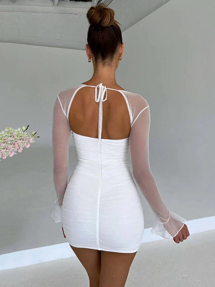 Elegante tunica da donna con collo alto ed eleganti polsini lunghi
