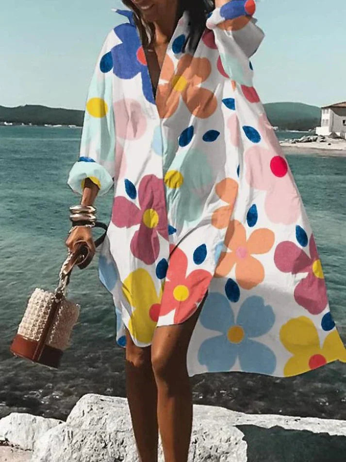 Elegante vestaglia da donna svasata con scollo a punta e polsini lunghi - elegante inserto asimmetrico