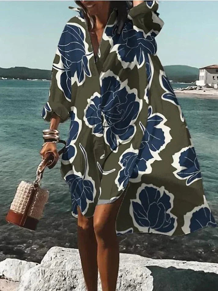 Elegante vestaglia da donna svasata con scollo a punta e polsini lunghi - elegante inserto asimmetrico