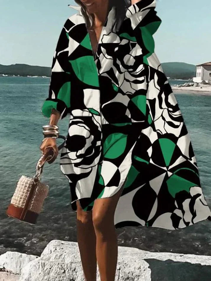 Elegante vestaglia da donna svasata con scollo a punta e polsini lunghi - elegante inserto asimmetrico