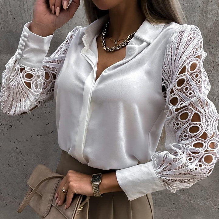 Elegante blusa da donna con maniche lunghe, accattivante scollatura profonda e dettaglio con bottoni - eleganza senza tempo
