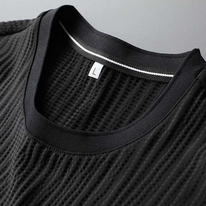 Elegante set tuta da uomo in tessuto plissettato - comoda T-shirt a maniche corte e comodi joggers dalla vestibilità rilassata