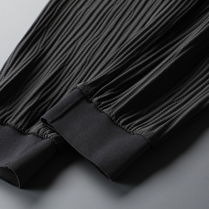Elegante set tuta da uomo in tessuto plissettato - comoda T-shirt a maniche corte e comodi joggers dalla vestibilità rilassata