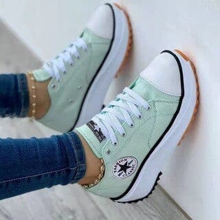 Eleganti scarpe da ginnastica da donna in tela con suola antiscivolo e comfort traspirante, perfette per l'uso quotidiano.