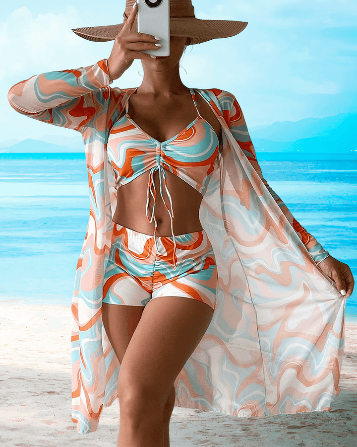 Elegante set da spiaggia da donna in 3 pezzi: cardigan lungo trasparente, top bikini frontale e pantaloncini a vita alta alla moda