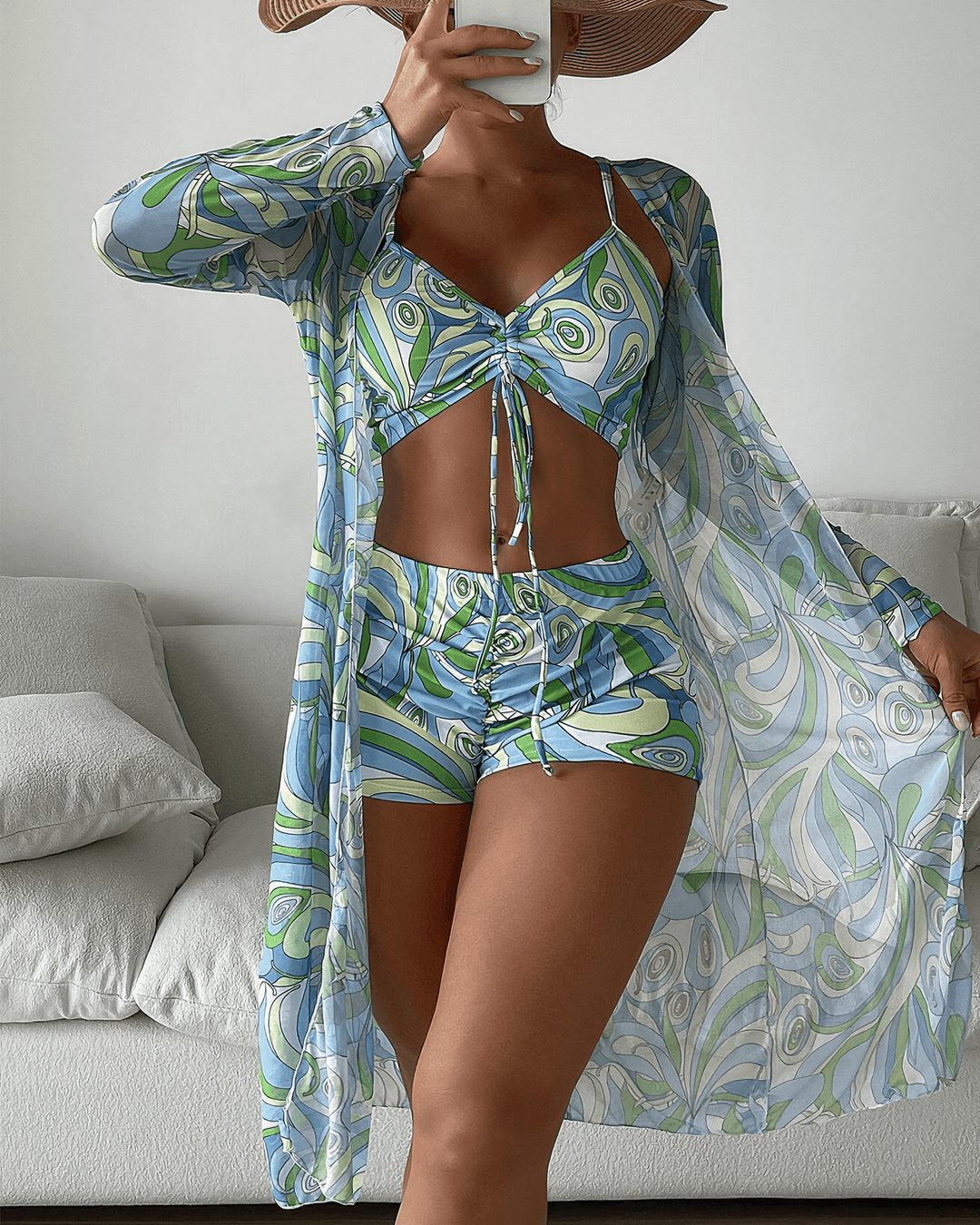 Elegante set da spiaggia da donna in 3 pezzi: cardigan lungo trasparente, top bikini frontale e pantaloncini a vita alta alla moda