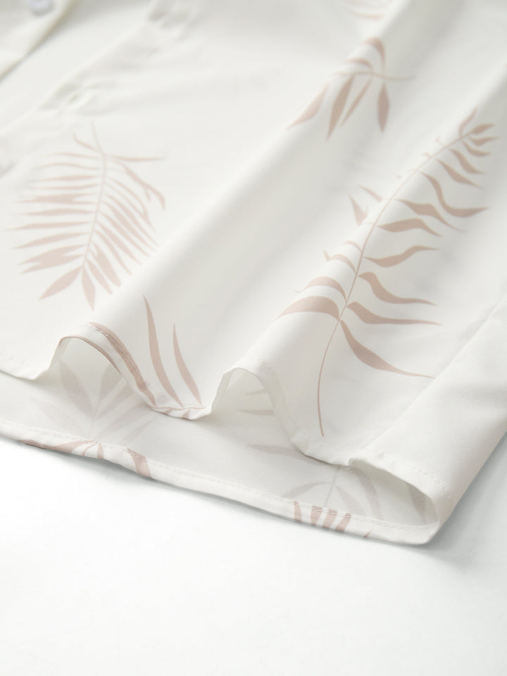 Elegante T-shirt tropicale da uomo con doppio taglio unico e suggestivo motivo di nappe esotiche