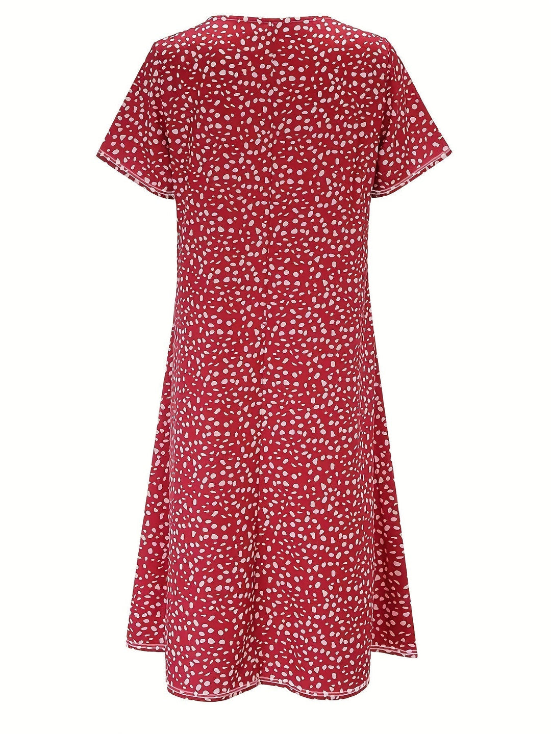 Elegante abito da donna al ginocchio con maniche corte, vestibilità ampia e scollatura arrotondata - un look casual comodo e leggero