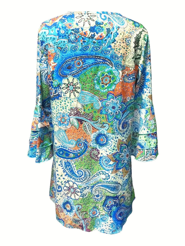 Elegante accappatoio da donna con scollo a punta, polsini lunghi, pratica zip ed elegante motivo paisley bohème