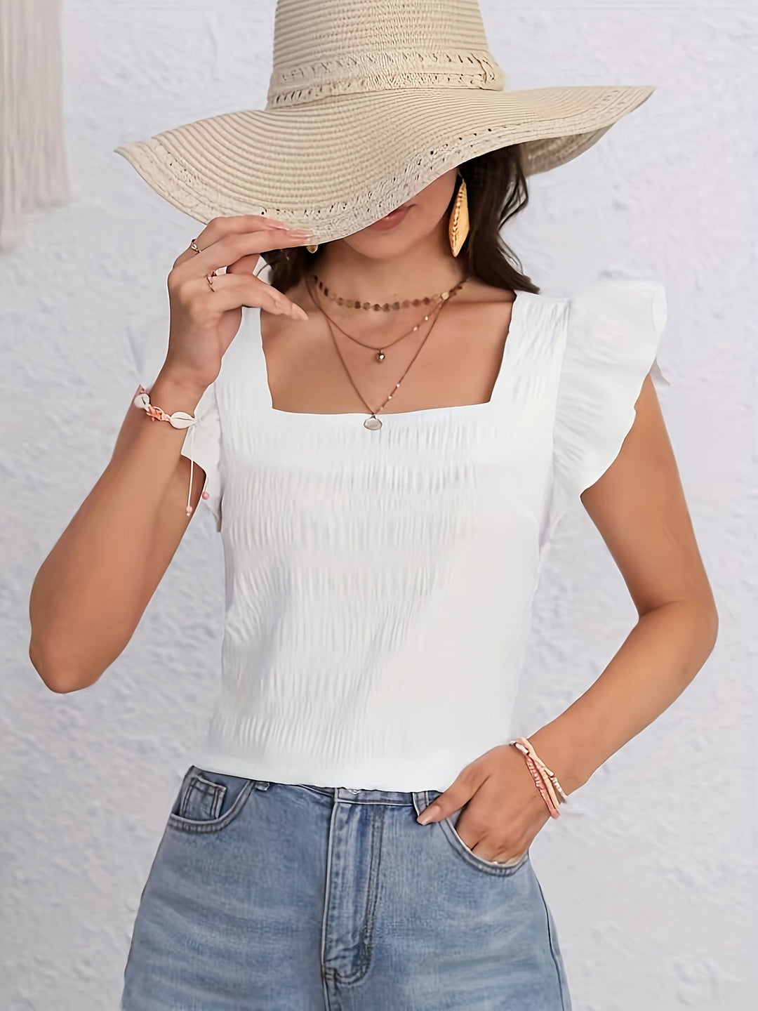 Camicette da donna alla moda con scollo rotondo e mango alla moda per un look elegante