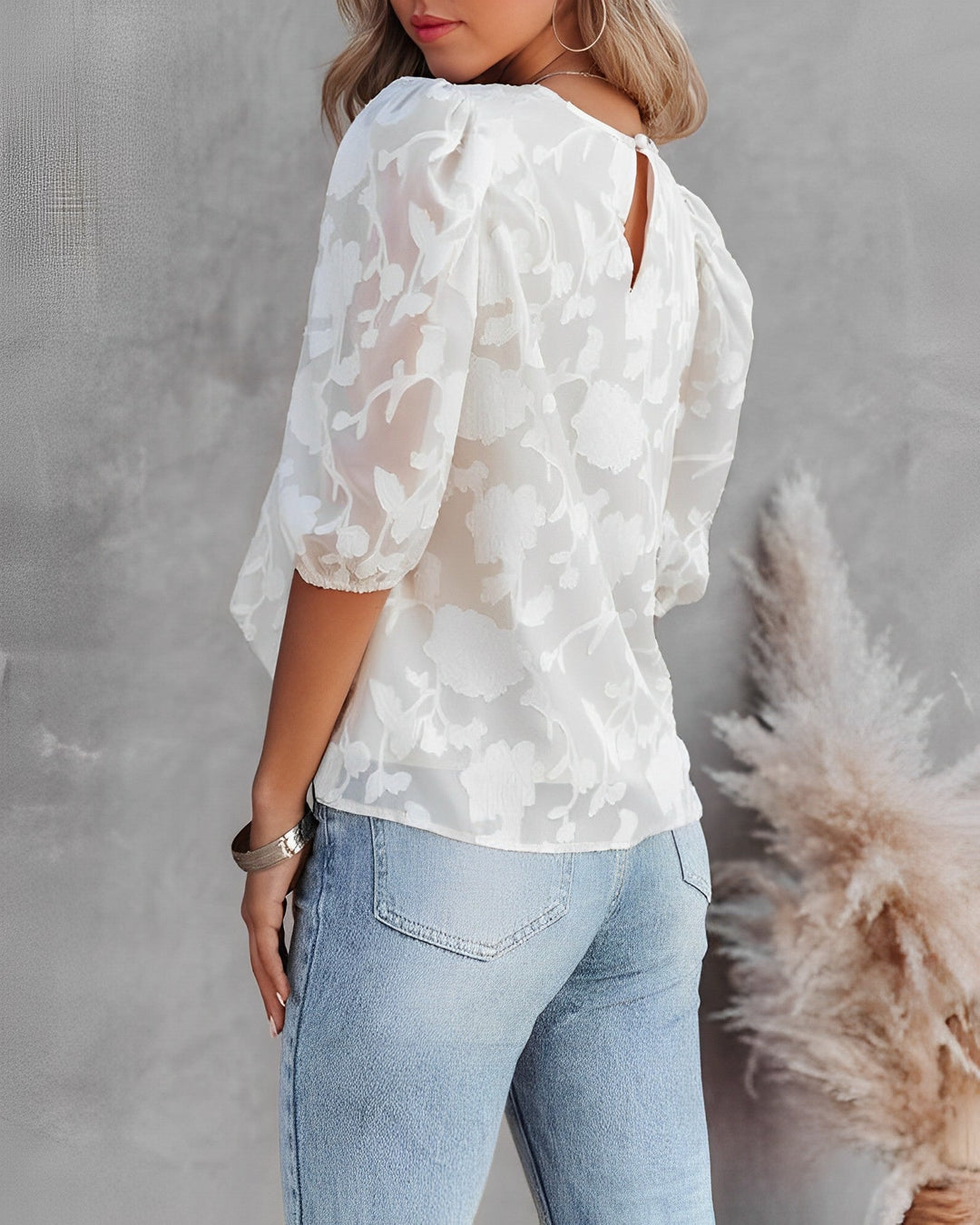 Elegante top in chiffon con motivo floreale e maniche a bolle adorabilmente divertenti