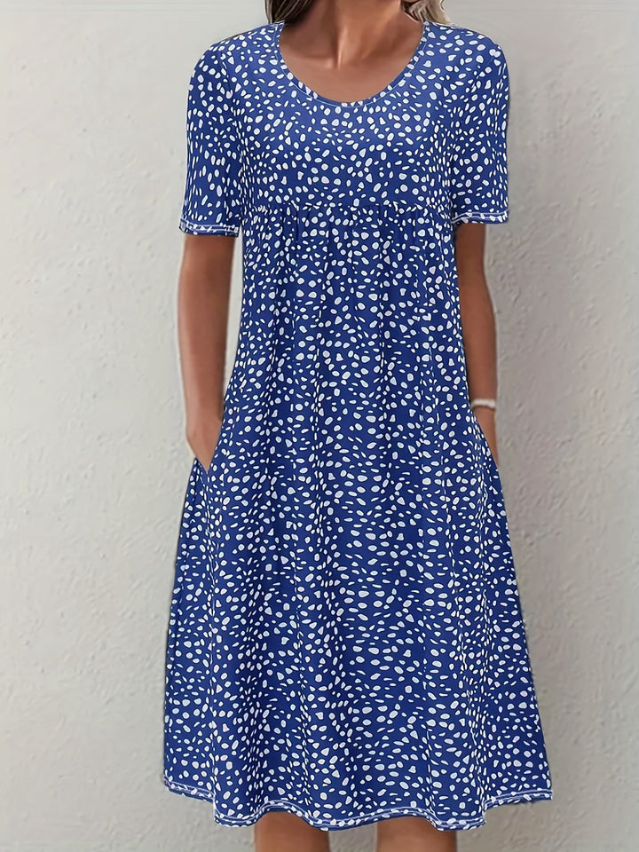 Elegante abito da donna al ginocchio con maniche corte, vestibilità ampia e scollatura arrotondata - un look casual comodo e leggero