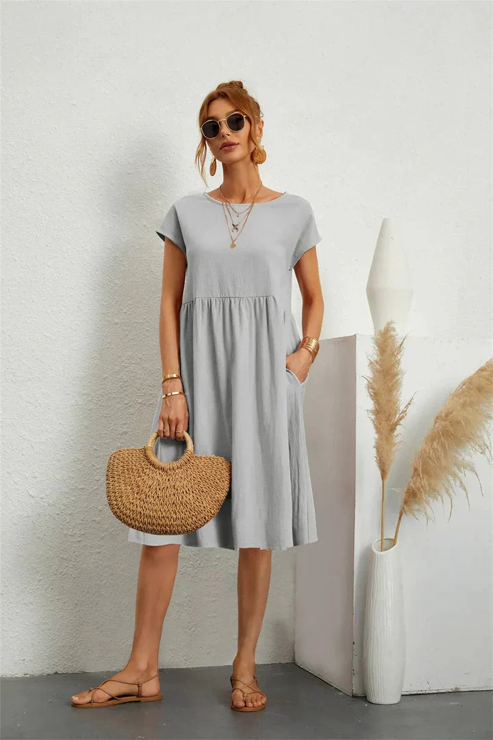 Elegante vestaglia da donna al ginocchio con scollo a punta e colletto elegante
