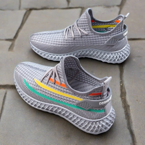 Sneakers da donna con tomaia in mesh traspirante, suola morbida e stile casual con lacci