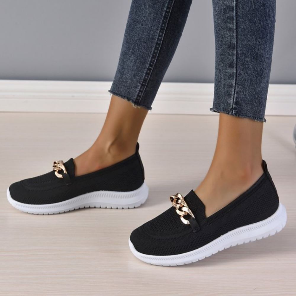 Sneakers da donna alla moda con tomaia traspirante e suola elegante per un comfort e una classe unici.